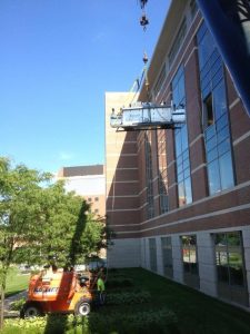 Removal of medical glovebox used for tuberculosis research at the Center for Medical Science in Albany