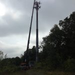 Working on a cell tower with our 90 ton Link-Belt. The customer used a man basket to replace 3 antennas on the tower.