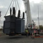 Picking the new 92,000 lb. transformer.