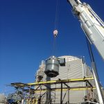 Reaching out and setting the motor. The motor weighed about 38,000 lbs.