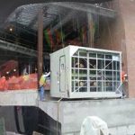 View from inside the operators cab of the crane.