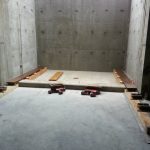 Because of the very tight restrictions of space we used our steerman dollies and flipped them upside down and placed a channel on top of them. We then landed the pieces on top of the channel and rolled it into the other set of steerman dollies to bring it into the building.