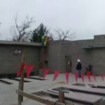 Panorama of job site before the first piece of concrete plank roof is set.