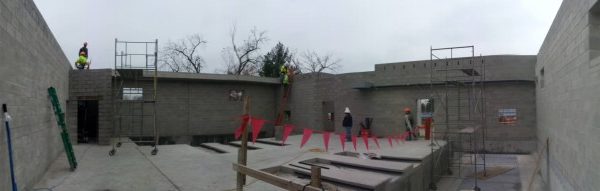 Panorama of job site before the first piece of concrete plank roof is set.