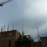 The scaffold had to be set up because we were working on two small A/C units on the side of a cell building on the rooftop. It was so close to the end of the building there was no room to work on the unit so the scaffold was built for a working platform.