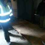 The threshold we need to cross is about 6 inches so we build a ramp using wooden wedges, plywood, and aluminum plates to help get the old transformers and the new transformers into and out of the room.