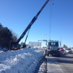 A Concrete vault we hauled to be unloaded on the side of highway.