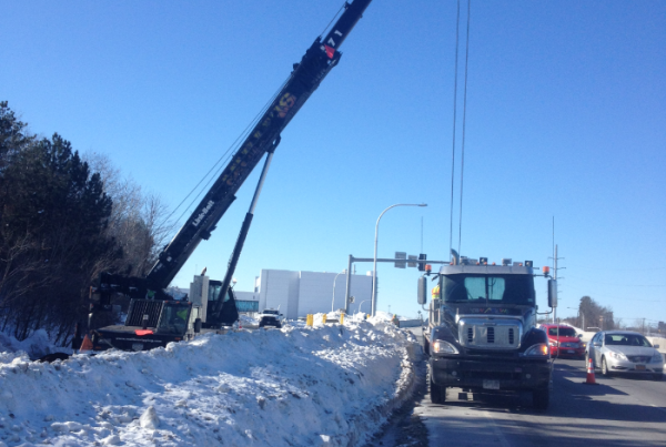 A Concrete vault we hauled to be unloaded on the side of highway.