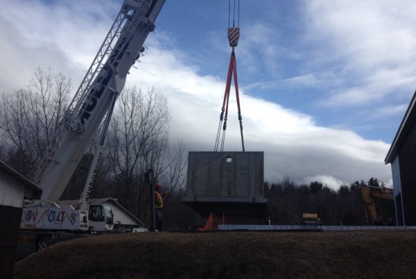 Using our Demag AC200 we set a 77,000 lb. concrete vault.