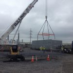 Setting 70,000 lb. building with our 2-18 ft. spreader bars good for 40 ton each.