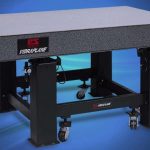 An optical table is a platform that is used to support systems used for optics experiments and engineering.
