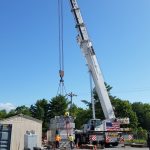 Loading a transformer that weighs 93,000 lbs. onto our trailer.