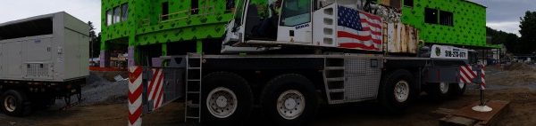 Panorama of jobsite. Unloading air conditioners we hauled to the site.