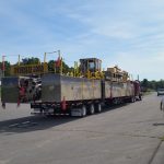 The dredge we took out of the river and loaded on truck for transport.
