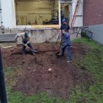 The ground outside was very steep so we had to dig a notch in the hill so that our wood crib would lay flat on the ground.