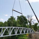 Swinging out the first truss.