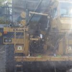 Lifting a 6,000 lb. engine into a 988 loader.