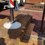 Using different levels of wood to make a flat surface for the crane outrigger.