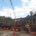 The bridge was 140 ft. long and weighed 56,000 lbs.