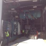 We use a fork truck to set the tank on top of the first chilller. The next time we go back there will be no room for the fork truck so we will use a beam clamp and chainfall from the ceiling.