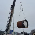 Lifting the boiler.