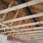 Picture of the beam going through the inside of the building.