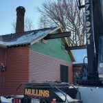 Another unique job done by Mullins Rigging. The home owner wanted a second story to their home. The builder wanted to keep the roof intact. So what do you do. Call us up and have us pick the roof off of the building. We lift the roof off by sliding two large beams through the builiding and picking from these points. Once the roof was off the builder builds the second floor and then we return to set the roof back on top. We make the impossible possible at Mullins Rigging.