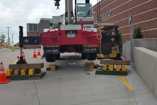 Extra blocking required to level the crane because of the steep ramp of the Emergency Room entrance.