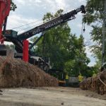 This crane is fantastic in getting into tight spots and can handle any situation. Here in this picture we are using full outriggers where we are working over and half on other outriggers.