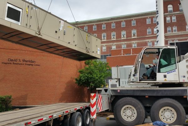 Lifting new A/C unit for Albany Medical Center