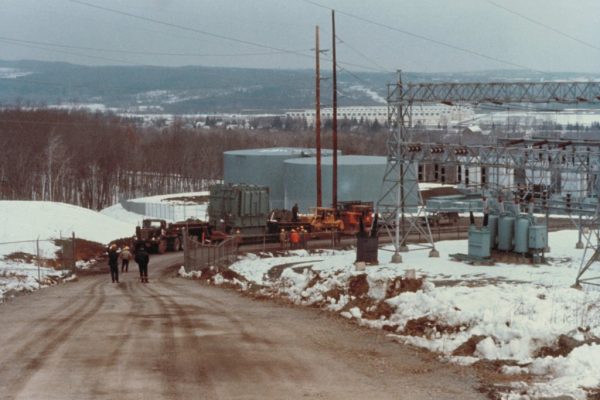 Mullins Rigging 220 Ton Transformer hauled up steep grade in Rotterdam. Note Bull dozers pushing trailer.