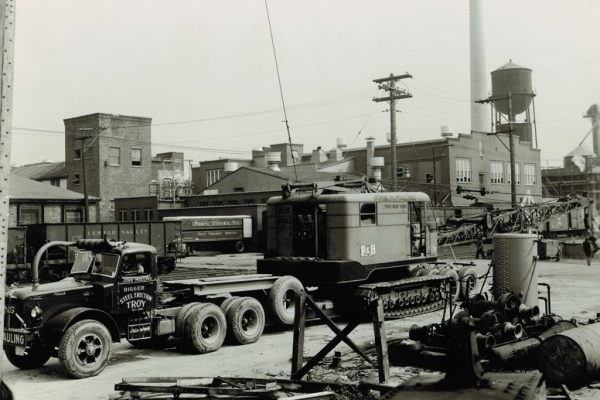 Mullins Rigging transport of crane. Note position of truck exhaust and crank out windows on tractor