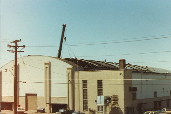Mullins Rigging removal of roof trusses at R.P.I. (Houston Field house)