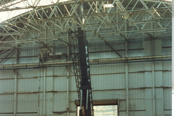 Mullins Rigging removal of roof trusses at R.P.I. (Houston Field house)
