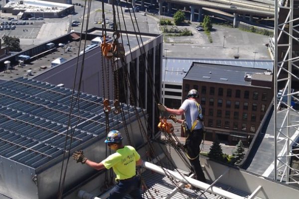 Mullins Rigging cooling tower coil replacement on 24 story Bldg. – Albany, N.Y.