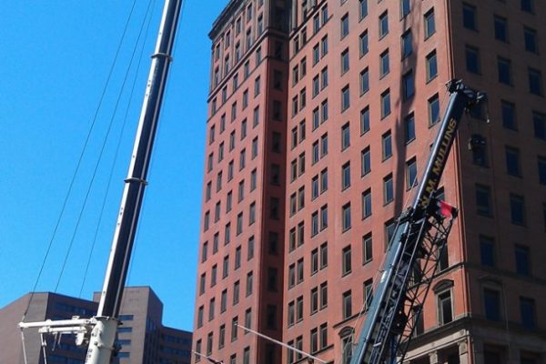 Mullins Rigging cooling tower coil replacement on 24 story Bldg. – Albany, N.Y.