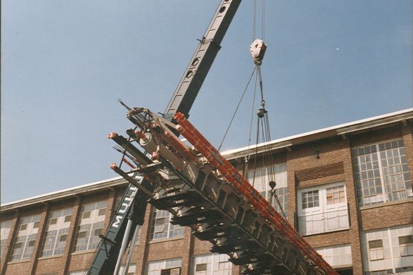 Mullins Rigging installation of weaving loom at Albany International